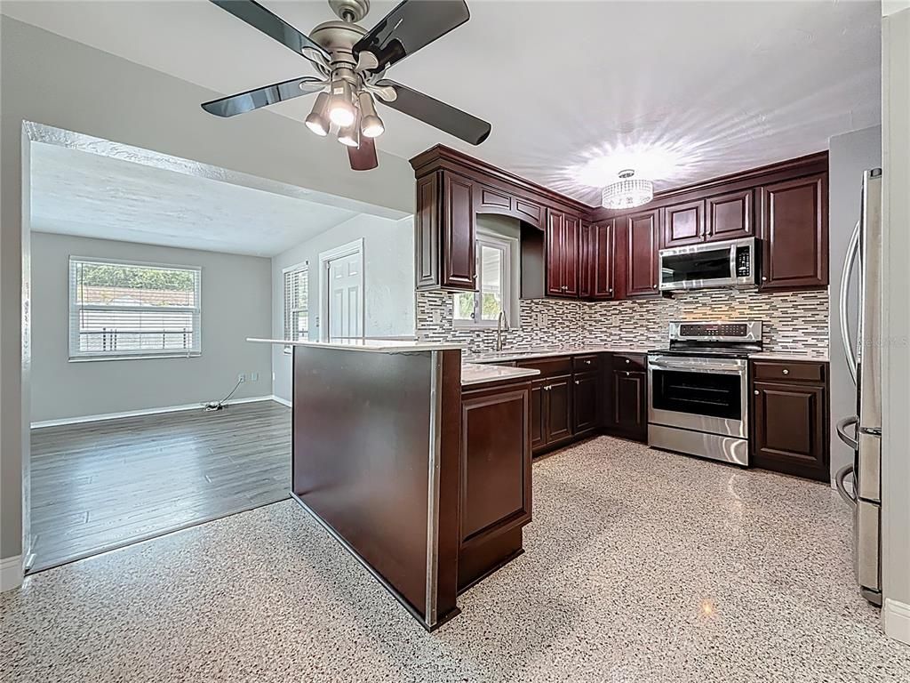 Chandelier, Interior, Kitchen, Stainless Steel Appliances, Wood Texture Flooring