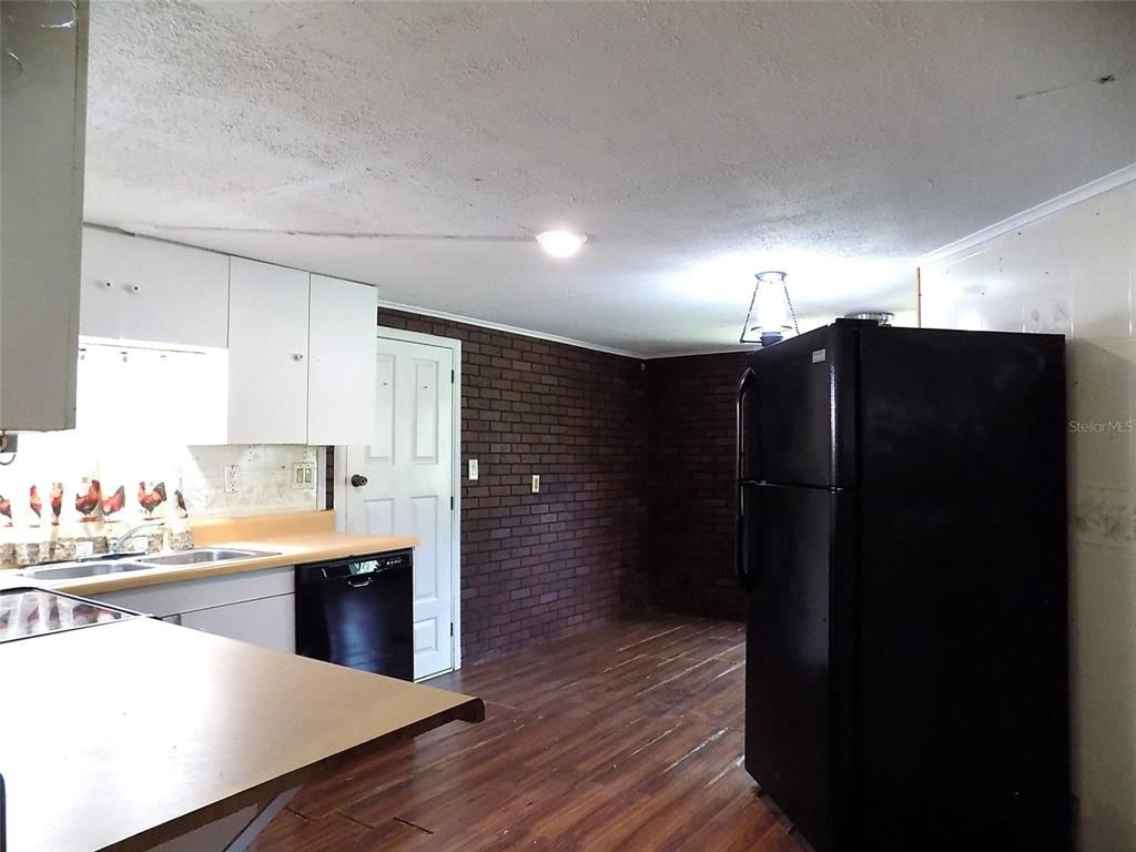 Interior, Kitchen, Recessed Lighting, Stone Walls, Wood Texture Flooring