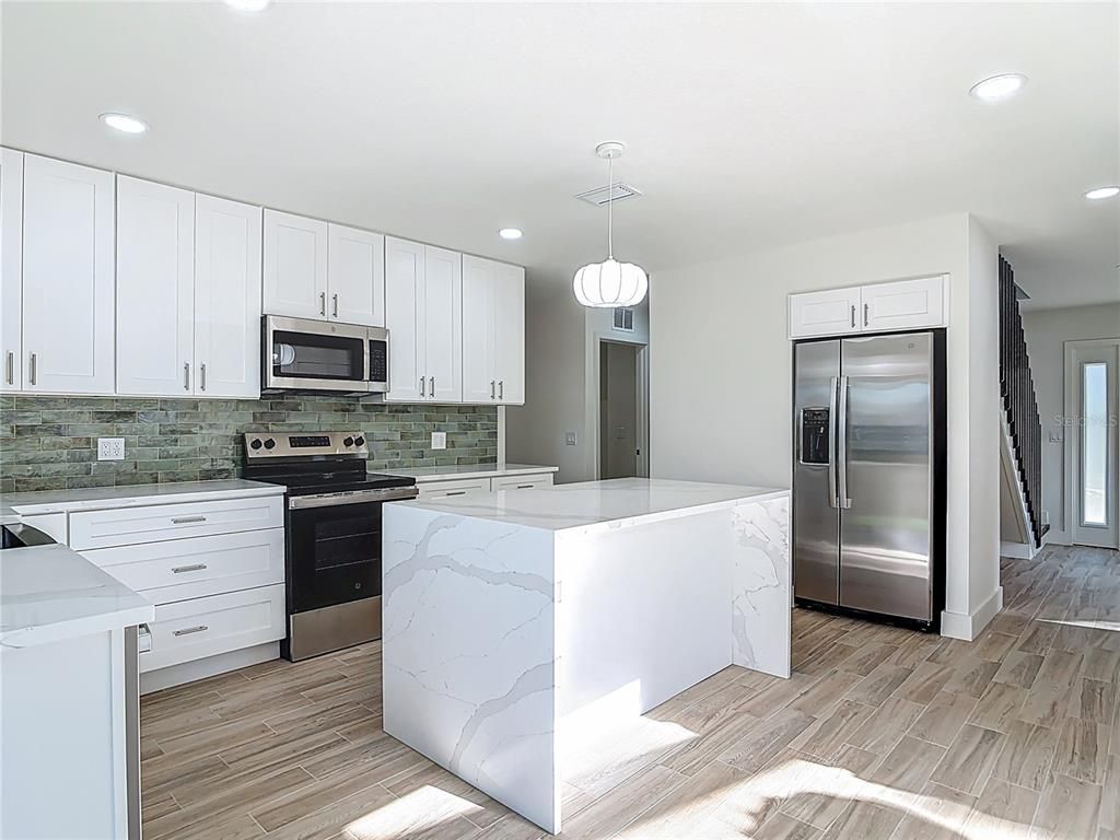 Interior, Kitchen, Pendant Lights, Recessed Lighting, Stainless Steel Appliances, Wood Texture Flooring
