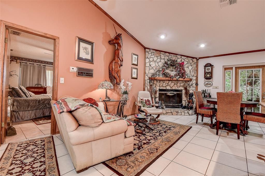 Dining room, Fireplace, Interior, Living room, Recessed Lighting, Stone Walls