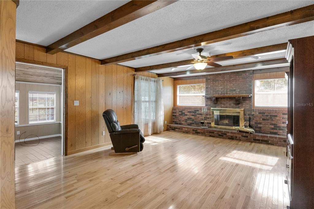 Empty room, Fireplace, Interior, Stone Walls, Wooden Beams, Wood Texture Flooring, Wooden Walls