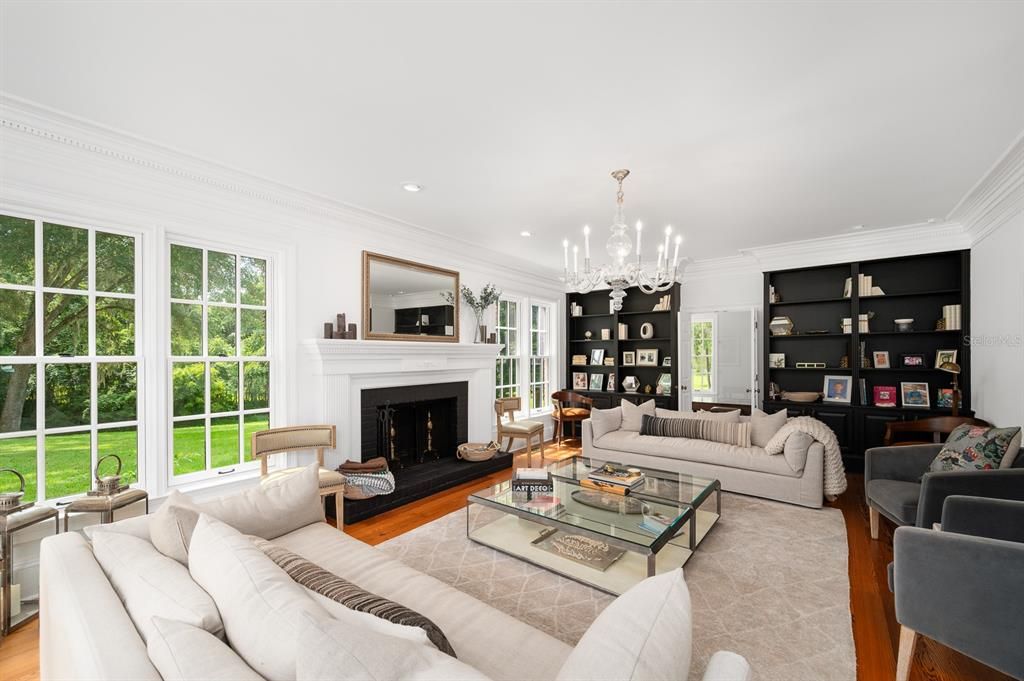 Chandelier, Fireplace, Interior, Living room, Pendant Lights, Recessed Lighting, Wood Texture Flooring