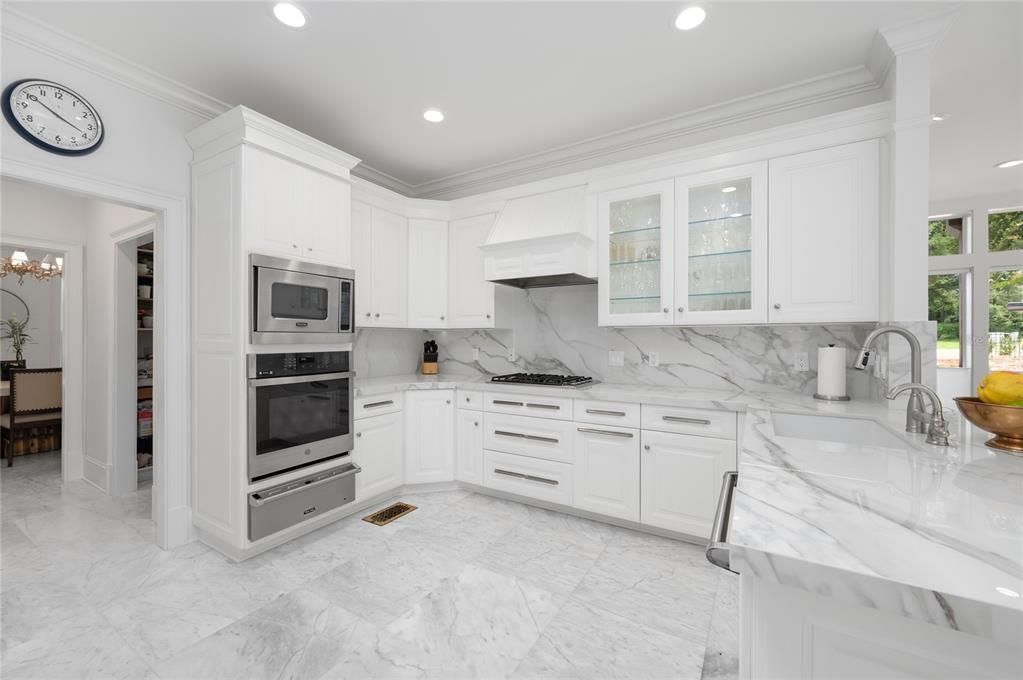 Interior, Kitchen, Marble, Marble Walls, Recessed Lighting, Stainless Steel Appliances