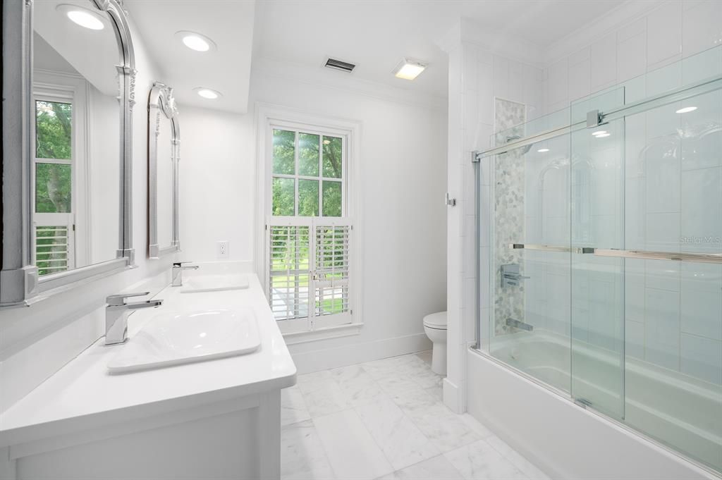 Bathroom, Dual Sink Vanities, Glass Shower, Interior, Marble, Recessed Lighting