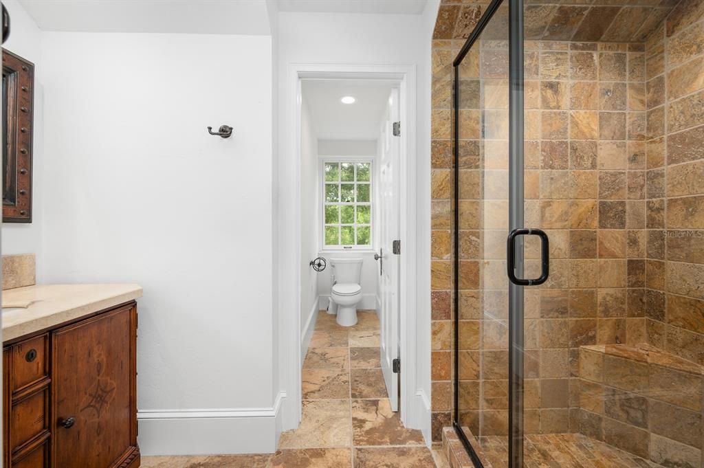 Bathroom, Glass Shower, Interior, Recessed Lighting, Stone Walls