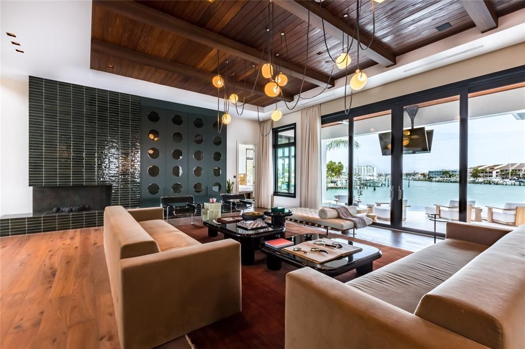 Fireplace, Interior, Living room, Pendant Lights, Water, Wooden Beams, Wooden Ceilings, Wood Texture Flooring