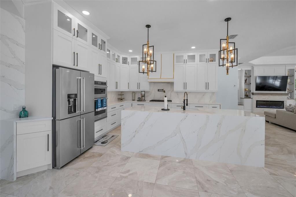 Fireplace, Interior, Kitchen, Pendant Lights, Recessed Lighting, Stainless Steel Appliances