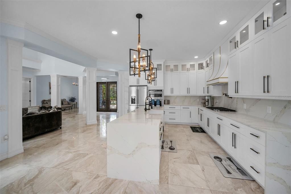 Interior, Kitchen, Marble, Marble Walls, Pendant Lights, Recessed Lighting, Stainless Steel Appliances