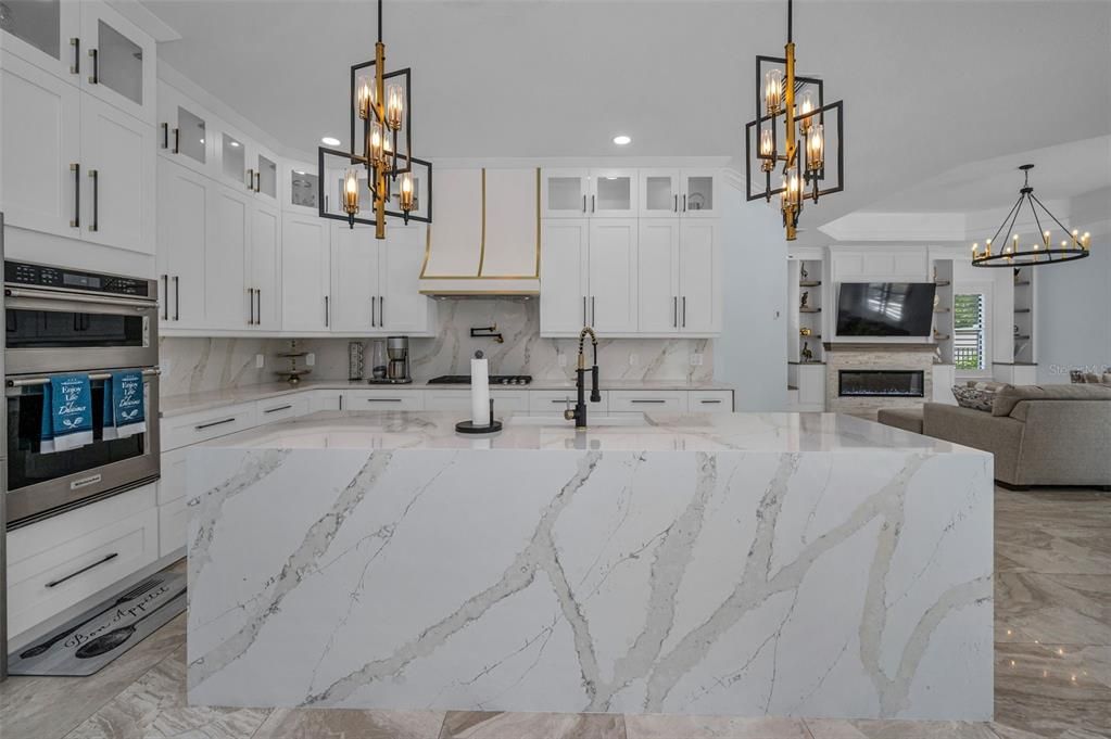 Fireplace, Interior, Kitchen, Marble, Pendant Lights, Recessed Lighting, Stainless Steel Appliances