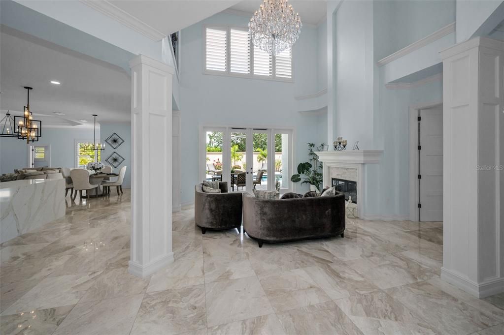 Chandelier, Dining room, Fireplace, Interior, Living room, Marble, Recessed Lighting