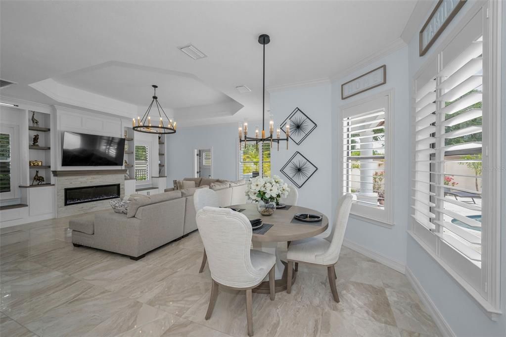 Dining room, Fireplace, Interior, Living room, Marble, Pendant Lights