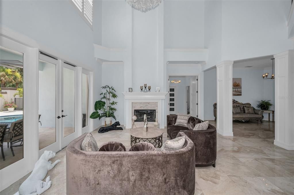 Chandelier, Fireplace, Interior, Living room, Marble