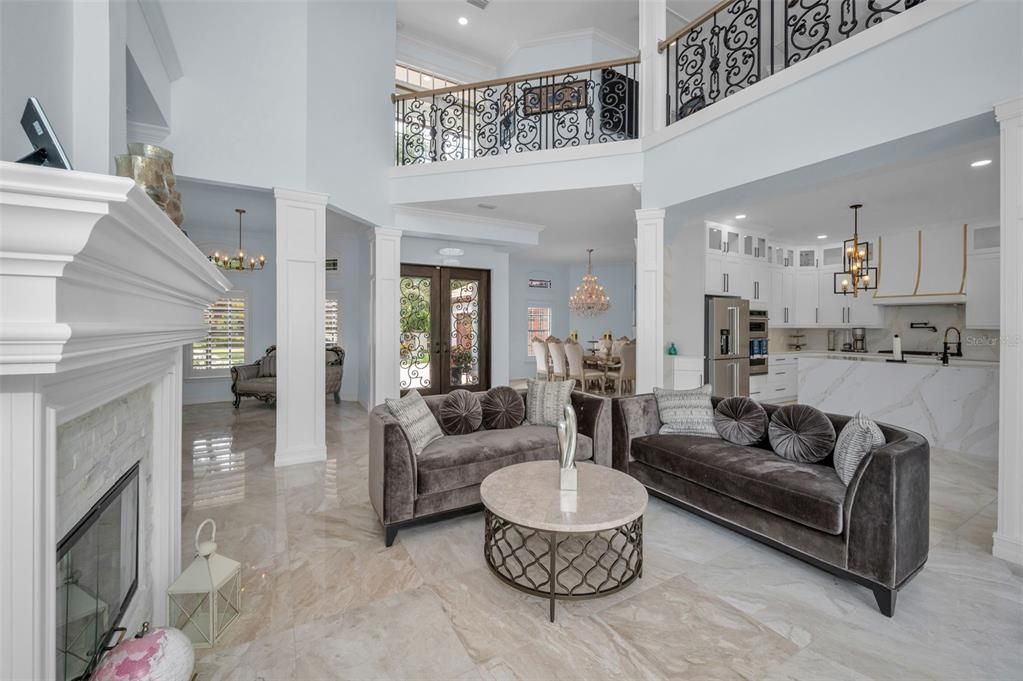 Chandelier, Dining room, Fireplace, Interior, Kitchen, Living room, Marble Walls, Pendant Lights, Recessed Lighting