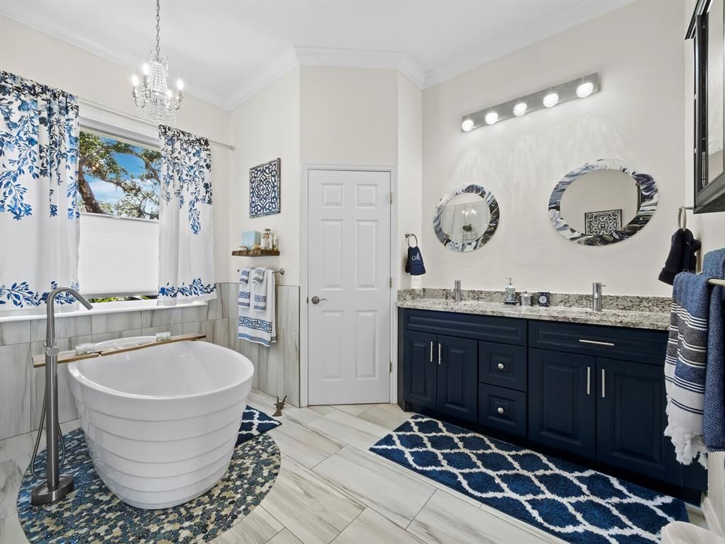 Bathroom, Chandelier, Dual Sink Vanities, Free Standing Baths, Interior, Pendant Lights