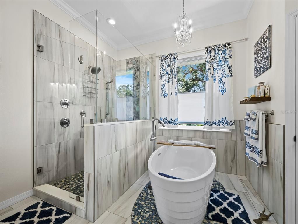Bathroom, Chandelier, Free Standing Baths, Glass Shower, Interior, Pendant Lights, Recessed Lighting