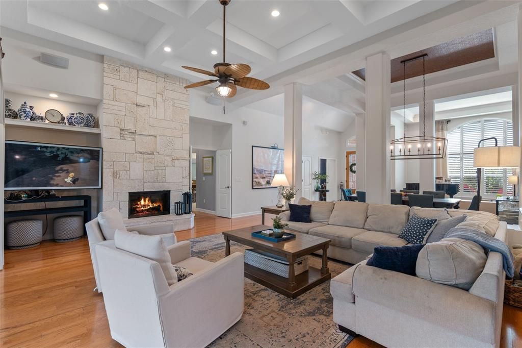 Dining room, Fireplace, Interior, Living room, Pendant Lights, Recessed Lighting, Stone Walls, Wood Texture Flooring