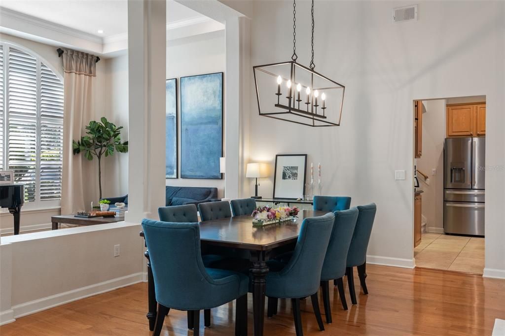 Chandelier, Dining room, Interior, Kitchen, Pendant Lights, Recessed Lighting, Stainless Steel Appliances, Wood Texture Flooring