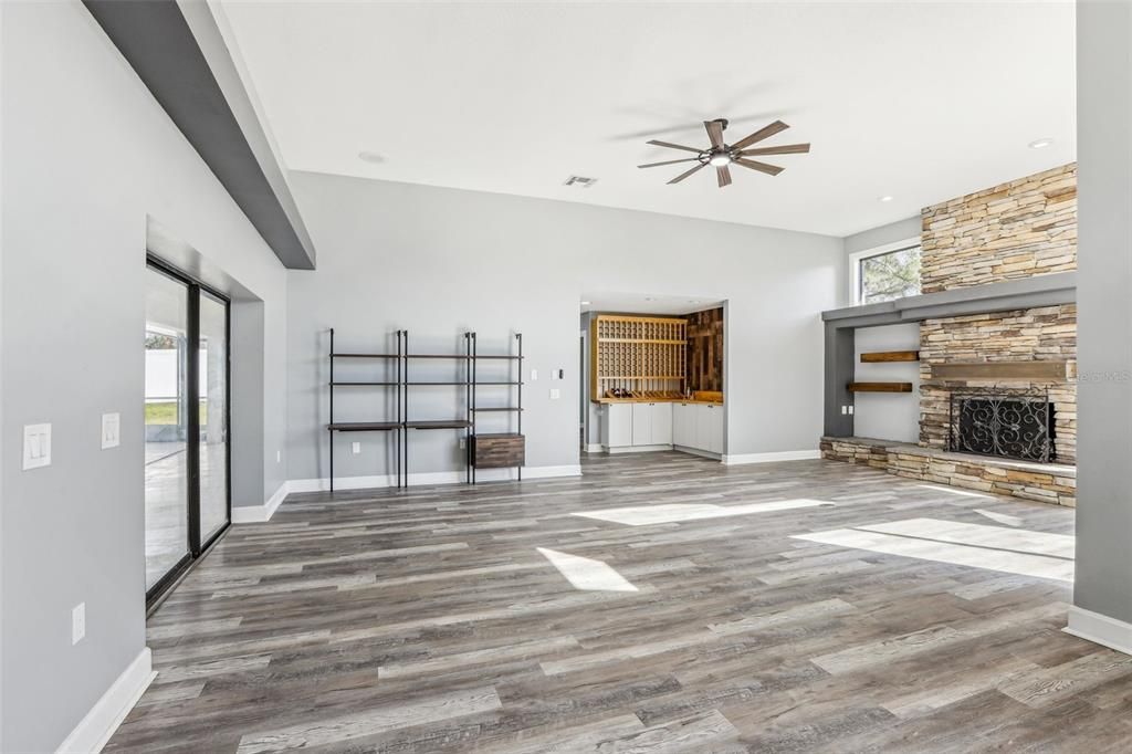 Empty room, Fireplace, Interior, Recessed Lighting, Wood Texture Flooring