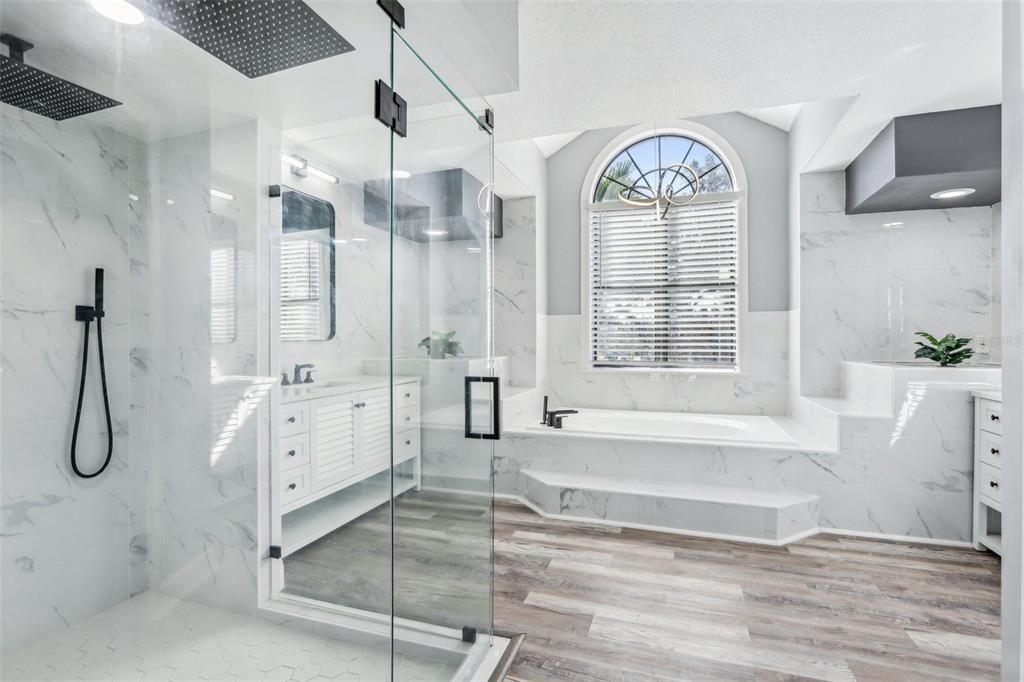 Bathroom, Glass Shower, Interior, Marble Walls, Recessed Lighting, Wood Texture Flooring