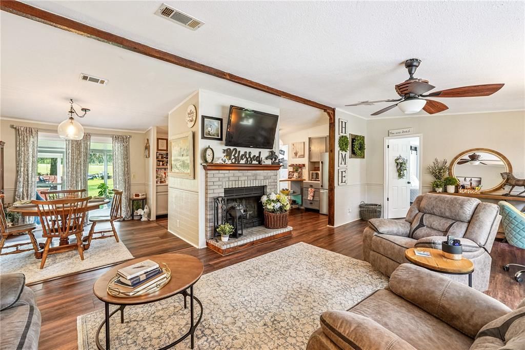 Dining room, Fireplace, Interior, Living room, Pendant Lights, Wood Texture Flooring