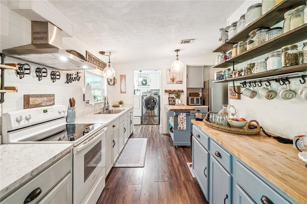 Interior, Kitchen, Pendant Lights, Washer, Wood Texture Flooring