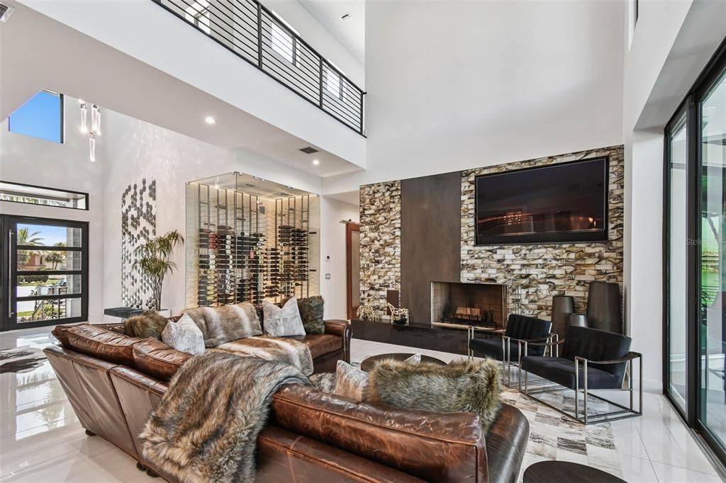Fireplace, Interior, Living room, Pendant Lights, Recessed Lighting, Stone Walls, Wine Storage