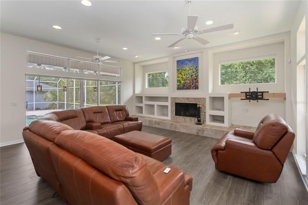 Fireplace, Interior, Living room, Recessed Lighting, Wood Texture Flooring