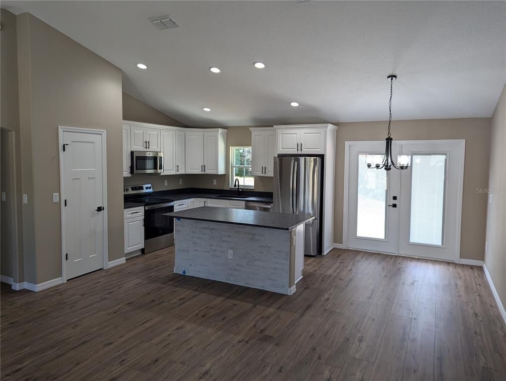 Interior, Kitchen, Pendant Lights, Recessed Lighting, Stainless Steel Appliances, Wood Texture Flooring