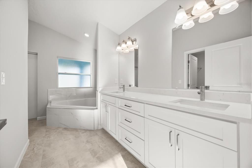 Bathroom, Dual Sink Vanities, Interior, Marble Walls, Recessed Lighting