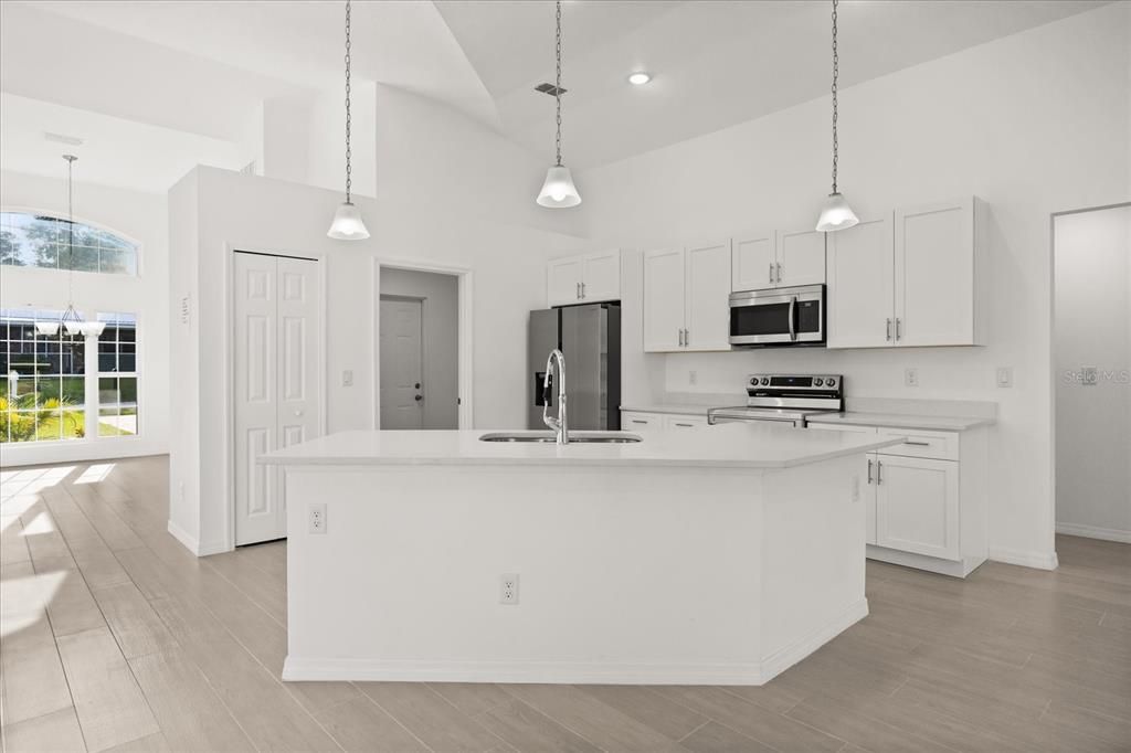 Interior, Kitchen, Pendant Lights, Recessed Lighting, Stainless Steel Appliances, Wood Texture Flooring