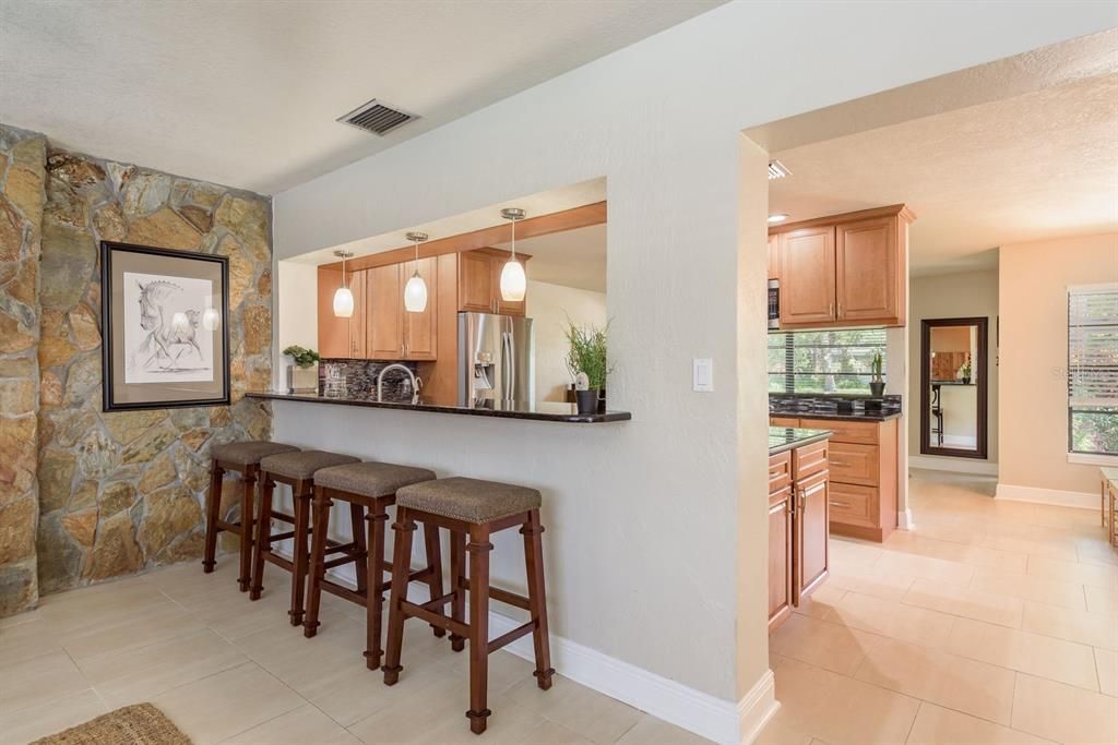 Interior, Kitchen, Pendant Lights, Stainless Steel Appliances, Stone Walls