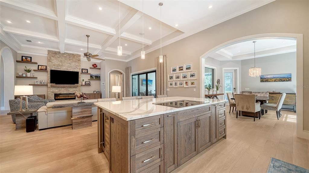 Dining room, Fireplace, Interior, Kitchen, Living room, Pendant Lights, Recessed Lighting, Wood Texture Flooring