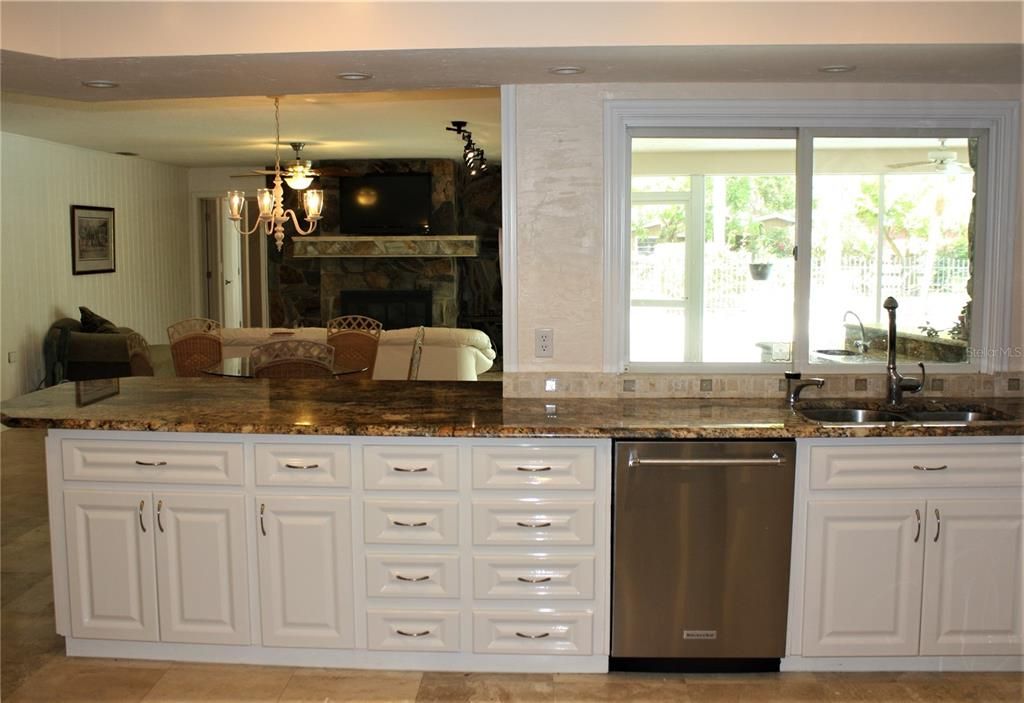 Chandelier, Dining room, Fireplace, Interior, Kitchen