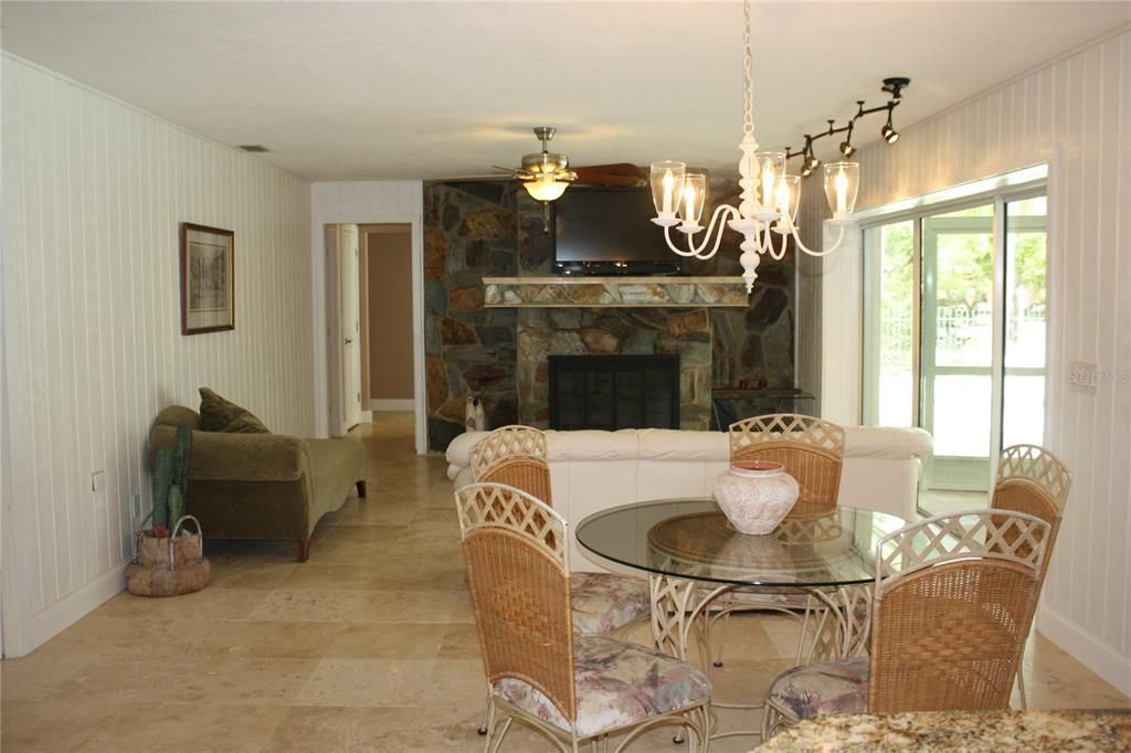 Chandelier, Dining room, Fireplace, Interior, Living room