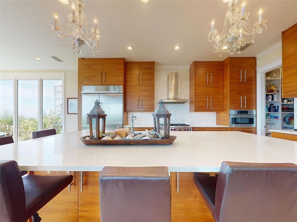 Chandelier, Dining room, Interior, Kitchen, Recessed Lighting, Stainless Steel Appliances, Wood Texture Flooring