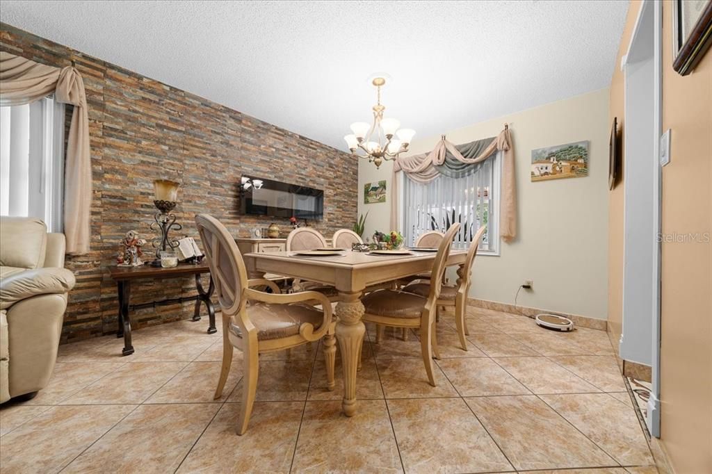 Chandelier, Dining room, Fireplace, Interior, Stone Walls