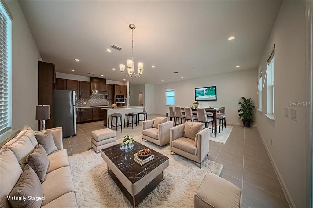 Chandelier, Dining room, Interior, Kitchen, Living room, Pendant Lights, Recessed Lighting, Stainless Steel Appliances