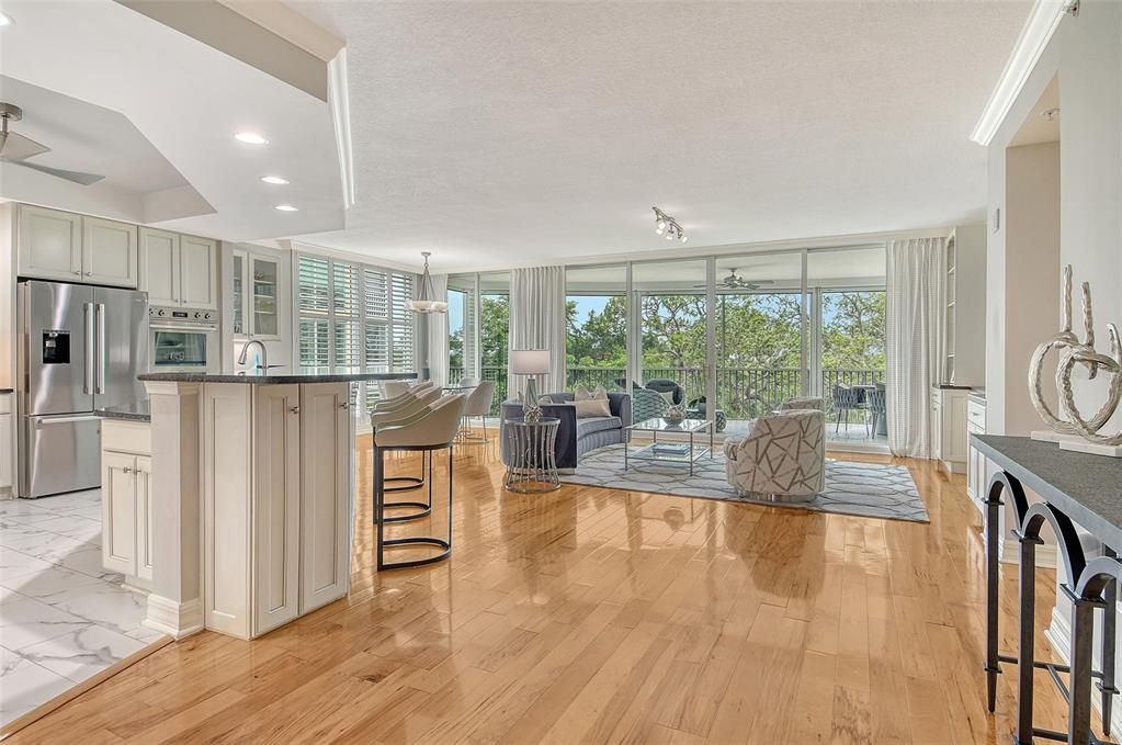 Dining room, Interior, Kitchen, Living room, Marble, Pendant Lights, Recessed Lighting, Stainless Steel Appliances, Wood Texture Flooring