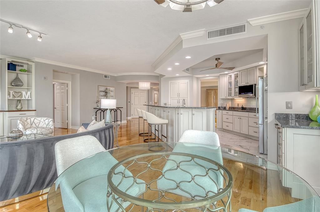 Dining room, Interior, Kitchen, Marble, Recessed Lighting, Stainless Steel Appliances, Wood Texture Flooring