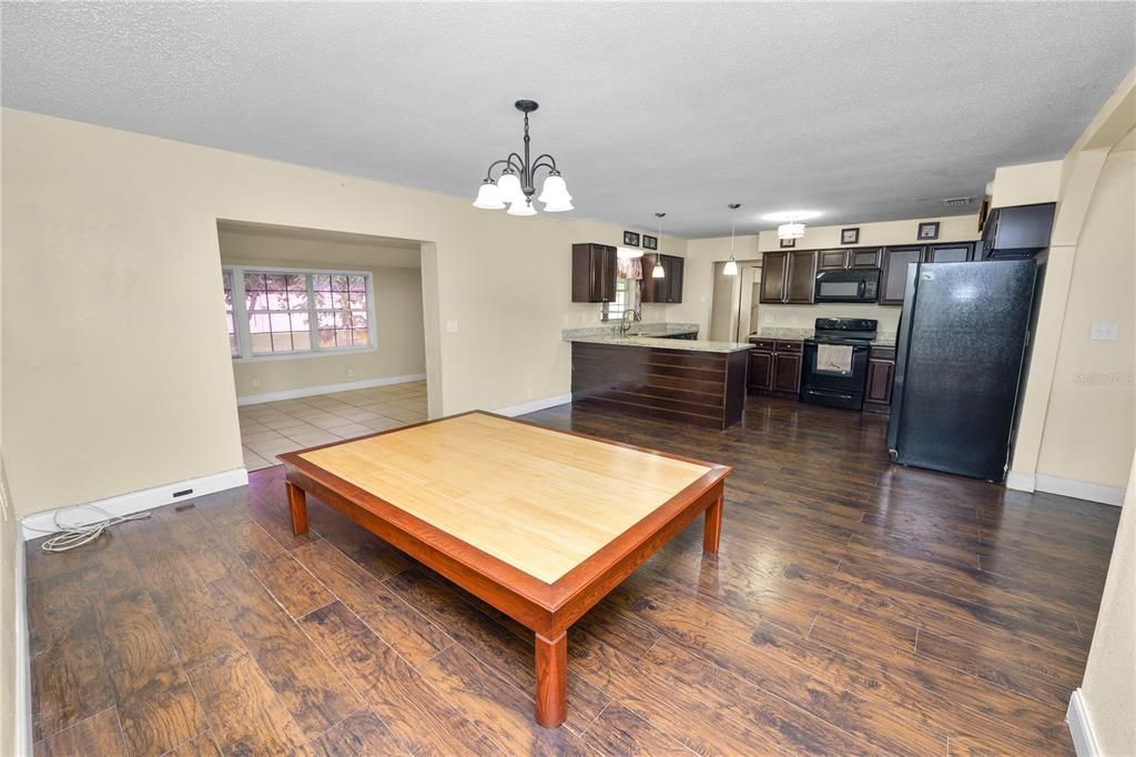 Chandelier, Interior, Kitchen, Pendant Lights, Stainless Steel Appliances, Wood Texture Flooring