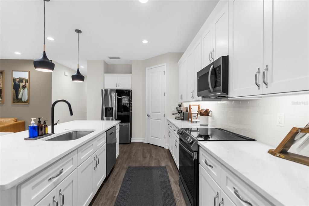 Interior, Kitchen, Pendant Lights, Recessed Lighting, Stainless Steel Appliances, Wood Texture Flooring