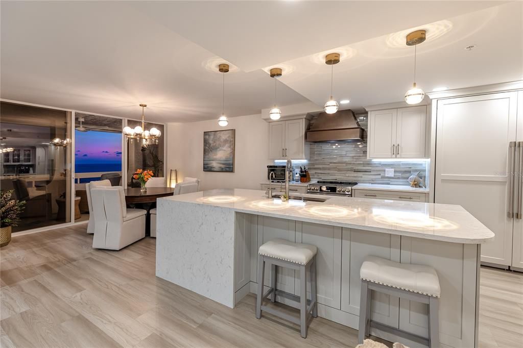 Chandelier, Dining room, Interior, Kitchen, Pendant Lights, Stainless Steel Appliances, Water, Wood Texture Flooring