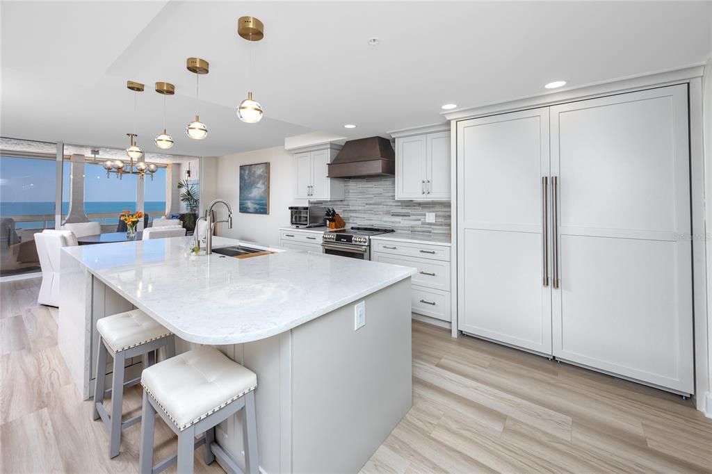 Dining room, Interior, Kitchen, Pendant Lights, Recessed Lighting, Stainless Steel Appliances, Water, Wood Texture Flooring