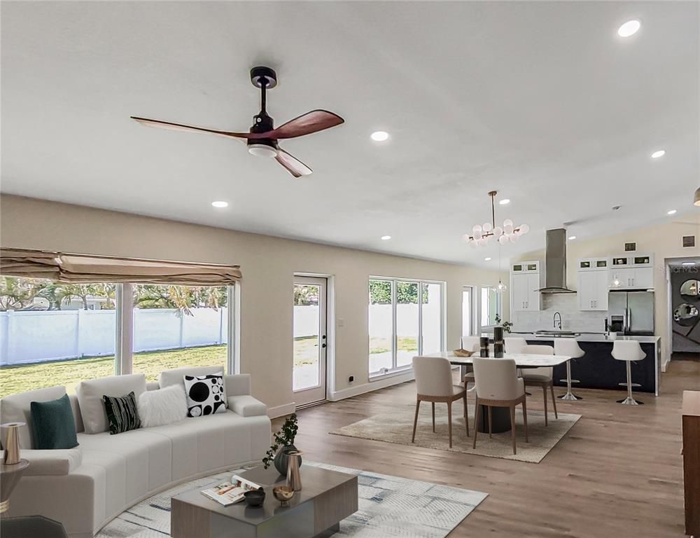 Dining room, Interior, Kitchen, Living room, Pendant Lights, Recessed Lighting, Stainless Steel Appliances, Wood Texture Flooring