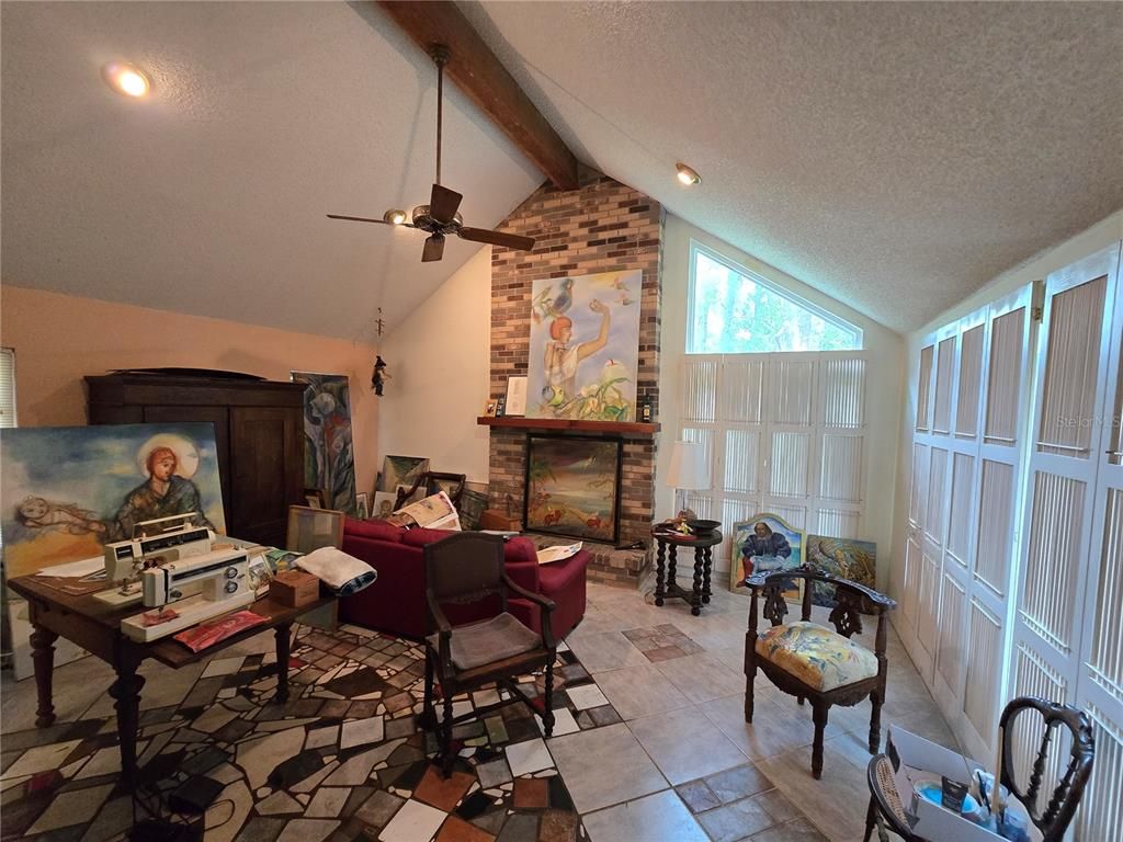 Fireplace, Interior, Living room, Recessed Lighting, Stone Walls, Wooden Beams