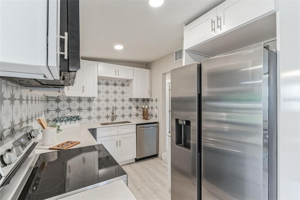 Interior, Kitchen, Recessed Lighting, Stainless Steel Appliances, Wood Texture Flooring
