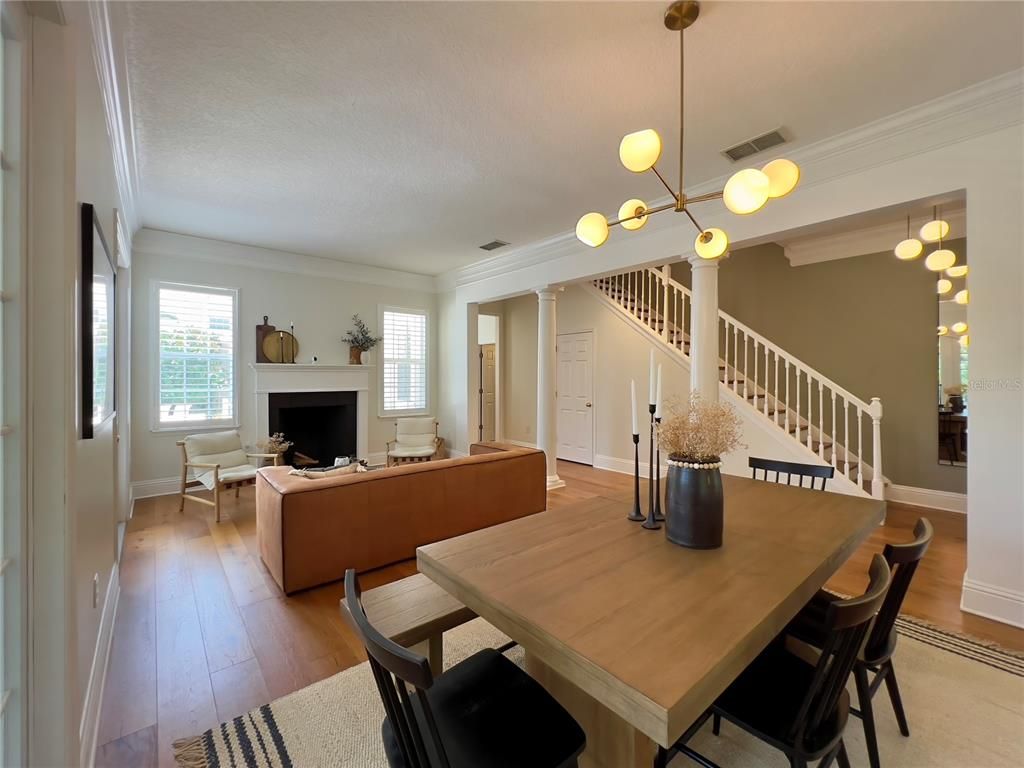 Dining room, Fireplace, Interior, Living room, Pendant Lights, Wood Texture Flooring