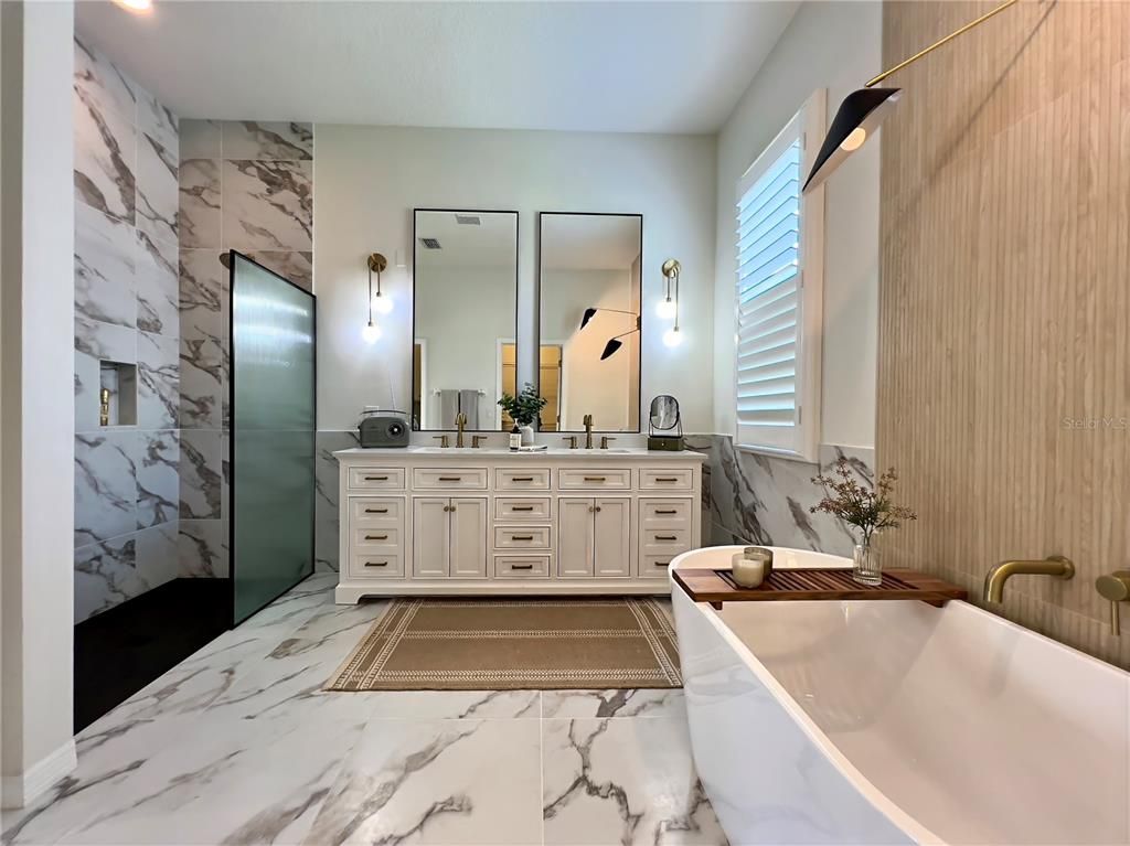 Bathroom, Dual Sink Vanities, Free Standing Baths, Interior, Marble, Marble Walls, Recessed Lighting