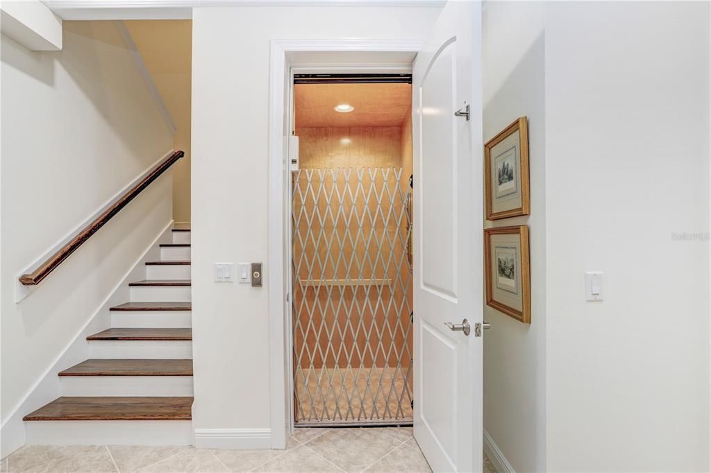 Elevator, Interior, Recessed Lighting, Wooden Ceilings, Wooden Walls