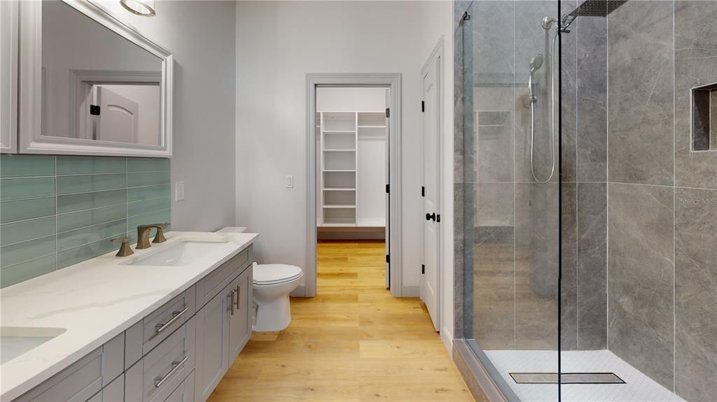 Bathroom, Dual Sink Vanities, Glass Shower, Interior, Wood Texture Flooring